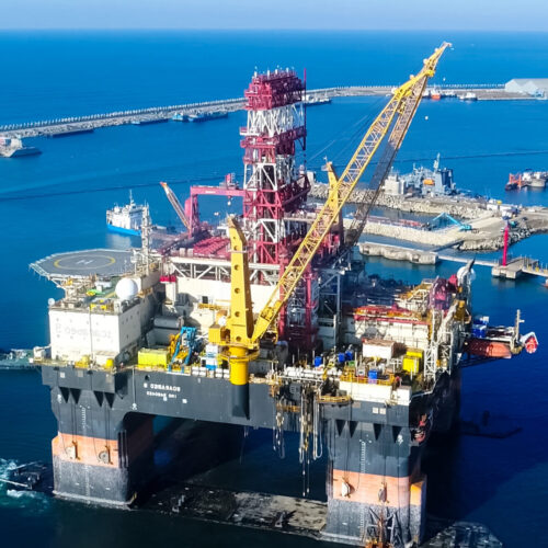 Drilling platform in the port. Towing of the oil platform Drilling platform in the port. Towing of the oil platform.